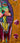 Detailaufnahme des Gemäldes Eva, Acryl auf Leinwand, kräftige Farbflächen und ornamentale Struktur, Werk von Giuseppe Di Martino.
